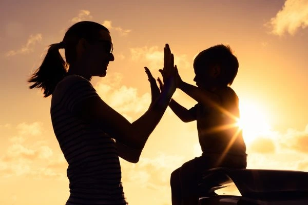 Image of happy mother and child after resolving child arrangements Lichfield